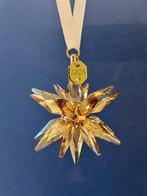 Swarovski Kerst 3D Ornament Festive 2025, gouden 3D ster., Verzamelen, Ophalen of Verzenden, Nieuw, Figuurtje