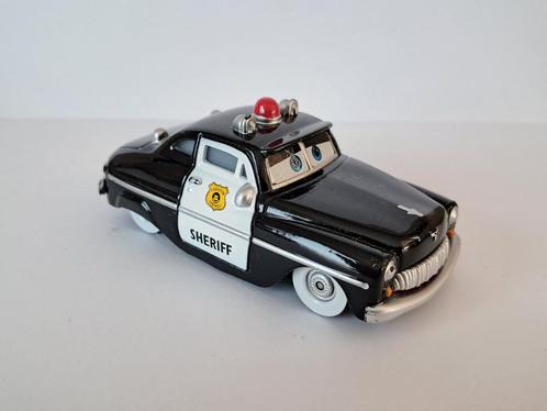 Cars Sheriff 1949 Mercury Police Cruiser, Hobby en Vrije tijd, Modelauto's | Overige schalen, Zo goed als nieuw, Auto, Ophalen of Verzenden