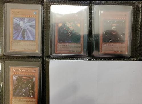1st edition MRD set ( Gate Guardian-Kazejin-Sanga-Suijin) yu, Hobby en Vrije tijd, Verzamelkaartspellen | Yu-gi-Oh!, Zo goed als nieuw