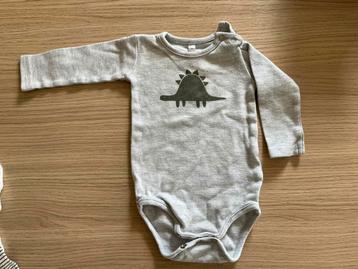  Baby romper met dino-print – maat 56 beschikbaar voor biedingen
