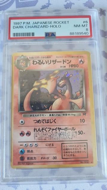 Charizard psa8 team rocket