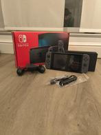 Nintendo switch zwart + Pokémon arceus + Hogwarts, Games en Spelcomputers, Games | Nintendo Switch, Ophalen of Verzenden, Zo goed als nieuw