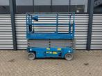Genie GS2632 Hoogwerker Schaarhoogwerker (bj 2014), Zakelijke goederen, Machines en Bouw | Liften, Steigers en Ladders