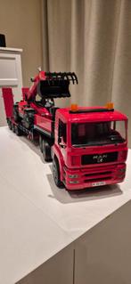 BRUDER oplegger met dieplader, Ophalen