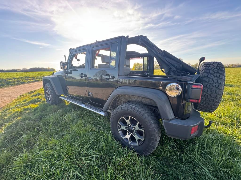 Jeep Wrangler JK Unlimited — faible kilométrage !, Autos, Land Rover, Entreprise, 4x4, Diesel, Automatique, Enlèvement