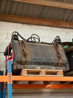 Mestklauw pelikaanbak, Ophalen