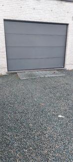 Sectionale poort ISO45 noblesse vlak ral 7022 Novoferm, Enlèvement