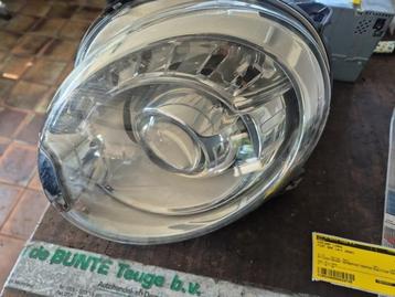 Koplamp links van een Fiat 500 beschikbaar voor biedingen