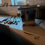 Vleesmolen en slagersgerief, Ophalen