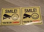 "Smile! You’re on Camera" Waarschuwingsstickers (2-pc) NIEUW, Envoi, Neuf