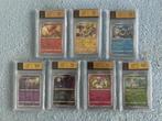 7 graded Pokémon card eevee evolutions  Holo, Hobby en Vrije tijd, Verzenden, Nieuw, Meerdere kaarten, Foil