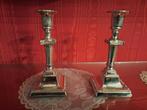 2 zilverkleurige metalen kandelaars, Ophalen