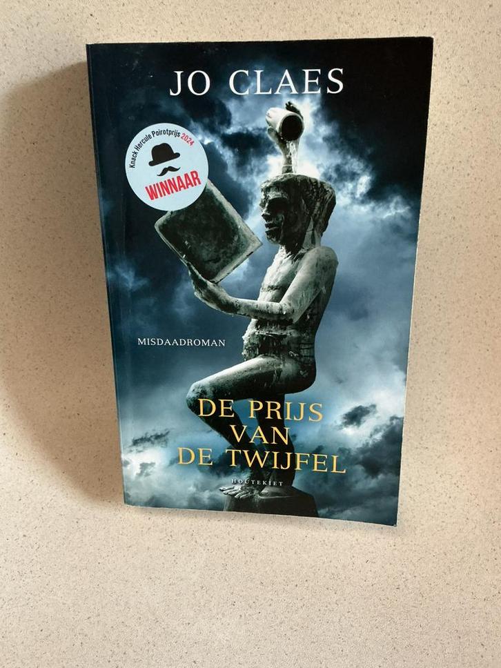Jo Claes - De prijs van de twijfel - verzending mogelijk, Boeken, Thrillers, Ophalen