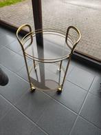 Charriot de bar Holiwood Regency métal doré et verres fumés, Enlèvement