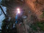 Mini tractor met clepelmaaier en frees