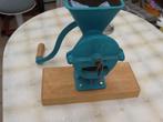 Antieke koffie molen, Ophalen