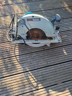 Koopje, Enlèvement ou Envoi, Scie à onglet