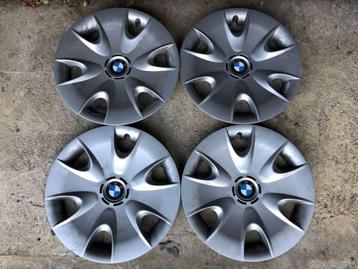 4 BMW 16 inch wieldoppen in goede staat