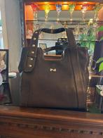 Handtas Nathan, Enlèvement