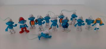 13 kleine smurfjes met koordje  beschikbaar voor biedingen