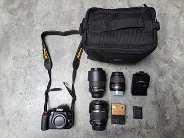 Nikon D3100 spiegelreflexcamera + 3 lenzen & accessoires beschikbaar voor biedingen