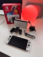 Nintendo switch Oled + 6+ digitale games, Games en Spelcomputers, Ophalen of Verzenden, Zo goed als nieuw, Switch OLED