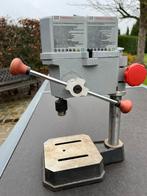 Kolomboormachine en bankvijs, Ophalen, Kolomboormachine