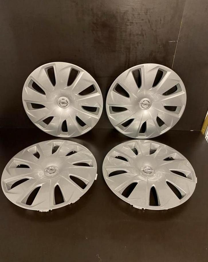 4 originele Opel Astra 15" wieldoppen, Auto diversen, Wieldoppen, Zo goed als nieuw, Ophalen of Verzenden