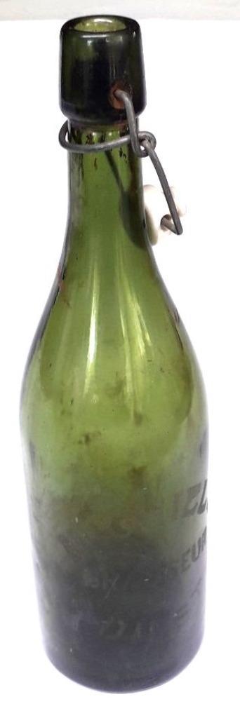 Grote fles met geëtste opdruk "Brasseur Michiels - Diest"