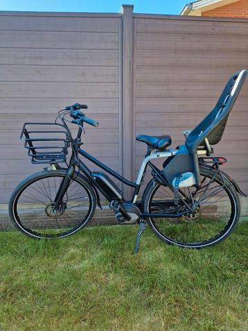 GLOEDNIEUWE Batavus Harlem damesfiets met kinderzitje  beschikbaar voor biedingen