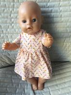 199. Babyborn: Nieuw pasteloranje jurkje met vogeltjes, Kinderen en Baby's, Speelgoed | Poppen, Ophalen of Verzenden, Nieuw, Babypop