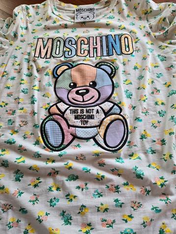 Schattige Moschino couture jurk met kleine bloemetjes. beschikbaar voor biedingen