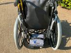Nieuwe hulpmotor voor aan manuele rolstoel te hangen.