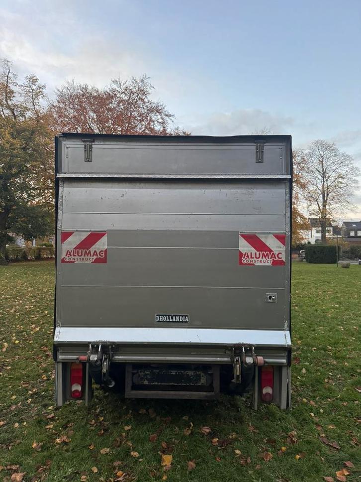 Nissan Cabstar 2.5d * Vorkheftruckbox*100000 Km Carpass OK, Auto's, Bestelwagens en Lichte vracht, Bedrijf, Te koop, ABS, Airbags