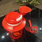 Sausmaker Tupperware, Ophalen