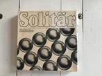 Solitair met metalen balletjes, Een of twee spelers, Ophalen, Gebruikt
