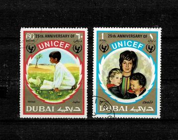 AZIË V.A.E. DUBAI UNICEF 2 POSTZEGELS GESTEMPELD - ZIE SCAN  beschikbaar voor biedingen