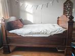 Massief houten bed, Ophalen