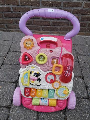 Vtech roze loopwagen met licht en geluid beschikbaar voor biedingen