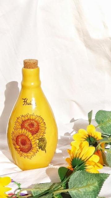 Vintage fles met zonnebloembloemen 