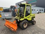 LM Trac snow removal machine
