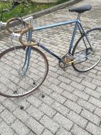 Herziene oude Motobecane-racefiets, Ophalen