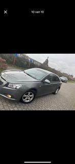 Chevrolet cruze 2010 1.6 benzine euro5, Auto's, Seat, Euro 5, Leder, Particulier, Zilver of Grijs