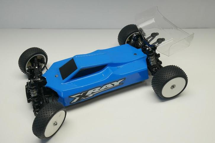 Xray XB4 2021 in zeer goeie staat, zie foto's van cardans, Hobby en Vrije tijd, Modelbouw | Radiografisch | Auto's, Gebruikt, Auto offroad