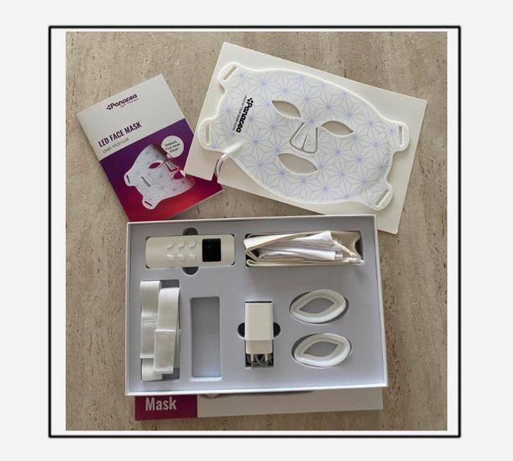 Panacea LED Mask – Gloednieuw (plastic nog rond)  €225, Handtassen en Accessoires, Uiterlijk | Lichaamsverzorging, Nieuw, Ophalen of Verzenden