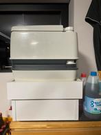 Draagbaar toilet, Ophalen, Gebruikt