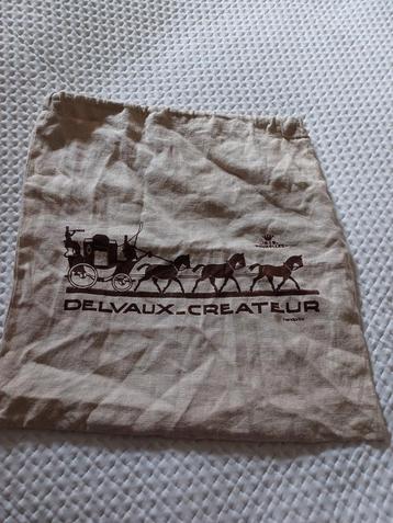 DELVAUX Linnen hoes met logo beschikbaar voor biedingen