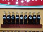 Coca Cola Flessen 100 Jarig Jubileum 9 verschillende, Verzamelen, Ophalen, Nieuw, Gebruiksvoorwerp