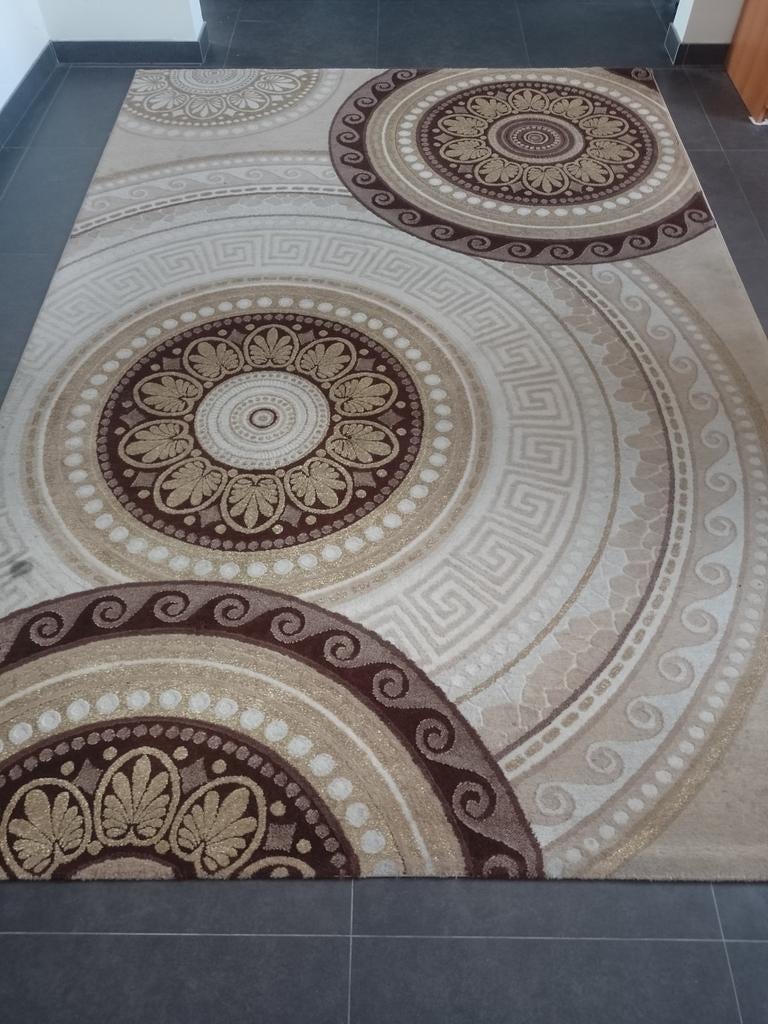 Zeer mooi tapijt, Ophalen