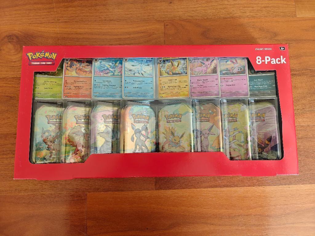 Prismatic Evolutions - Cosco tins collection, Ophalen of Verzenden, Nieuw, Boosterbox, Foil
